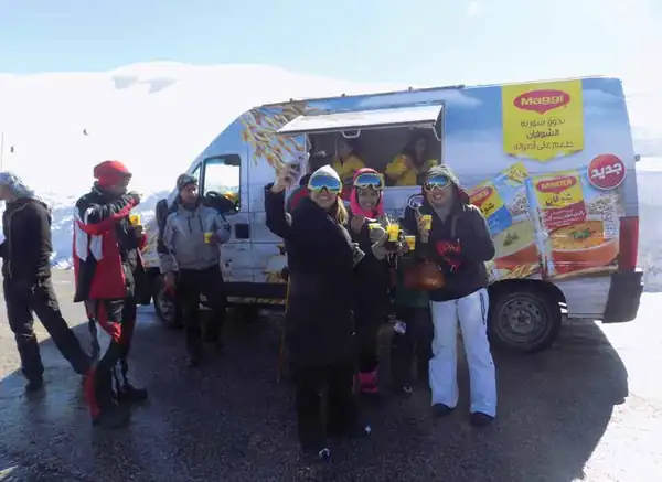 Maggi food van serving skiers in the snowy mountains