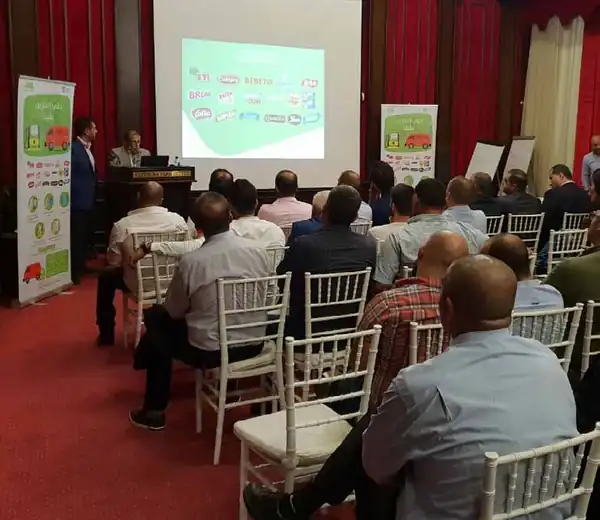 Product briefing for an audience in a hotel hall